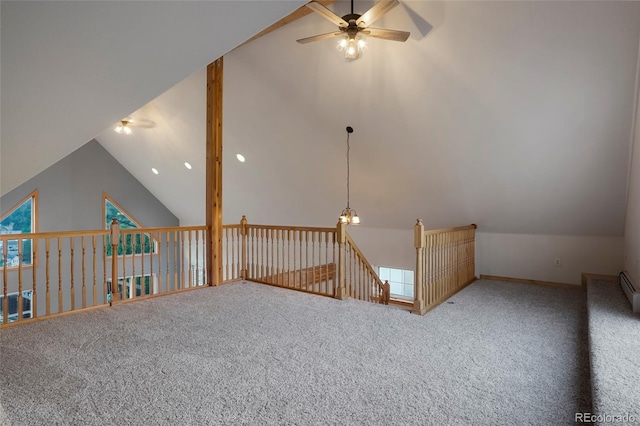 additional living space with lofted ceiling, carpet floors, and ceiling fan