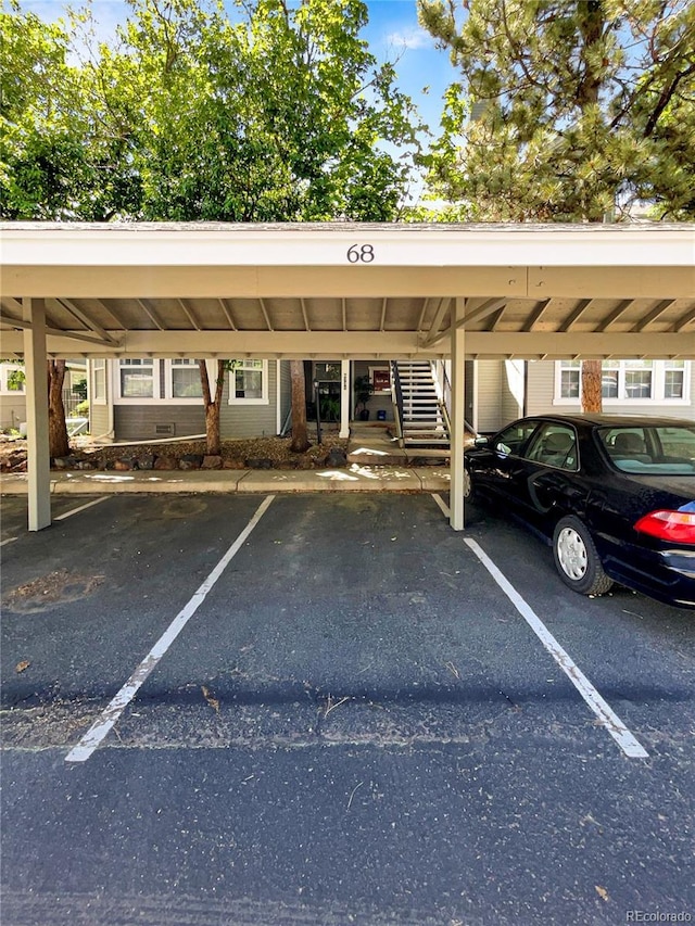 covered parking lot with stairway