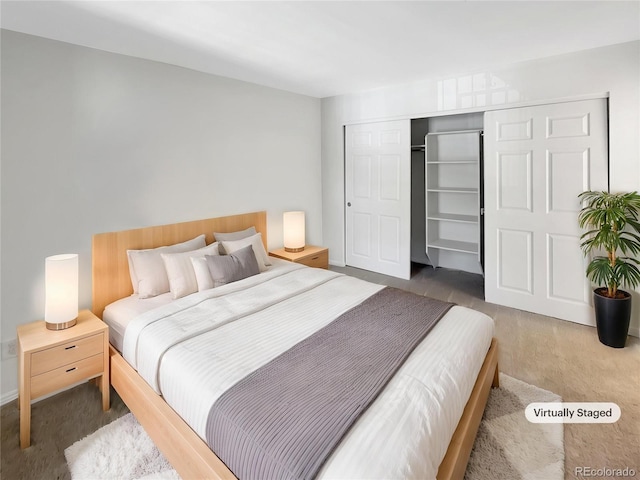 carpeted bedroom with a closet