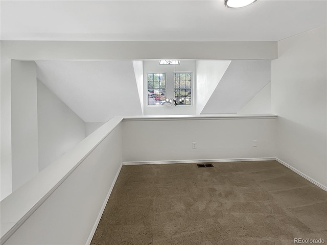 basement with carpet and baseboards