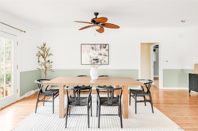6535 Balsam St, Arvada, CO 80004 - dining area featuring light wood-type flooring, baseboards, and ceiling fan