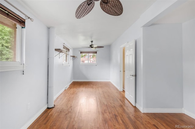 6535 Balsam St, Arvada, CO 80004 - unfurnished room featuring a ceiling fan, wood finished floors, and baseboards