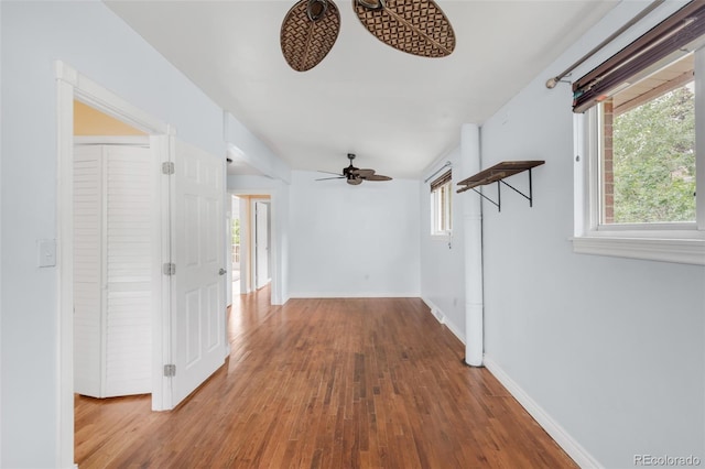 6535 Balsam St, Arvada, CO 80004 - hall with hardwood / wood-style flooring and baseboards