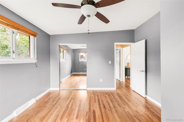 6535 Balsam St, Arvada, CO 80004 - empty room with light wood finished floors, baseboards, and ceiling fan