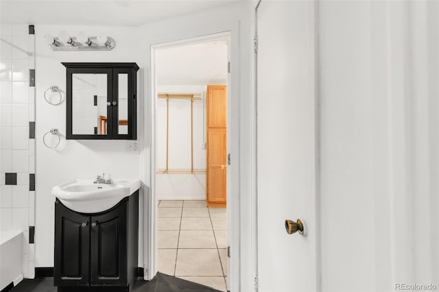 6535 Balsam St, Arvada, CO 80004 - bathroom featuring vanity and tile patterned flooring