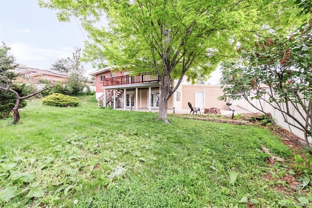 6535 Balsam St, Arvada, CO 80004 - view of yard featuring a wooden deck and stairway