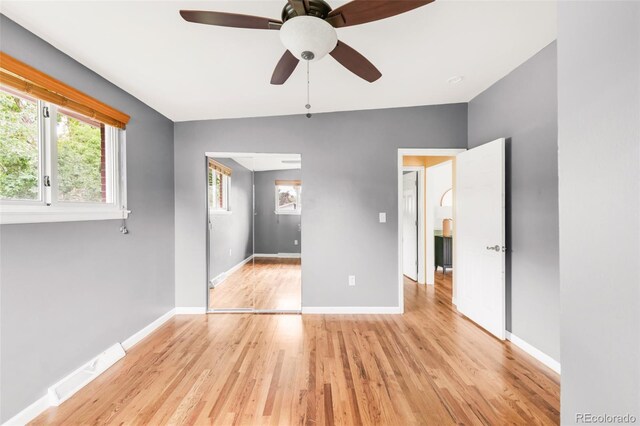 6535 Balsam St, Arvada, CO 80004 - unfurnished bedroom featuring light wood-type flooring and a ceiling fan