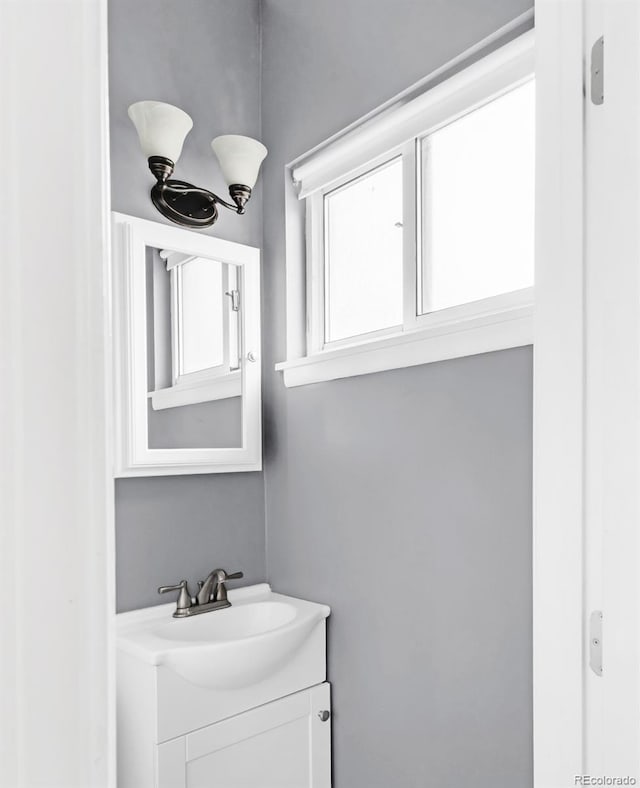 6535 Balsam St, Arvada, CO 80004 - bathroom featuring vanity