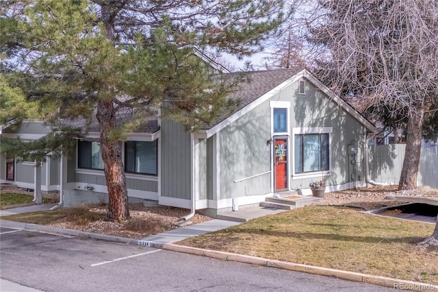 view of front of home with a front lawn