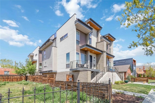 2409 Court Pl, Denver, CO 80205 - view of home's exterior featuring fence