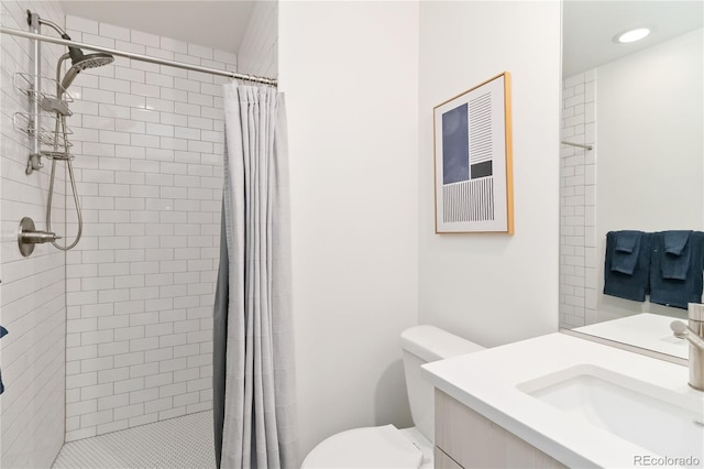 2409 Court Pl, Denver, CO 80205 - full bathroom featuring vanity, recessed lighting, toilet, and a shower stall
