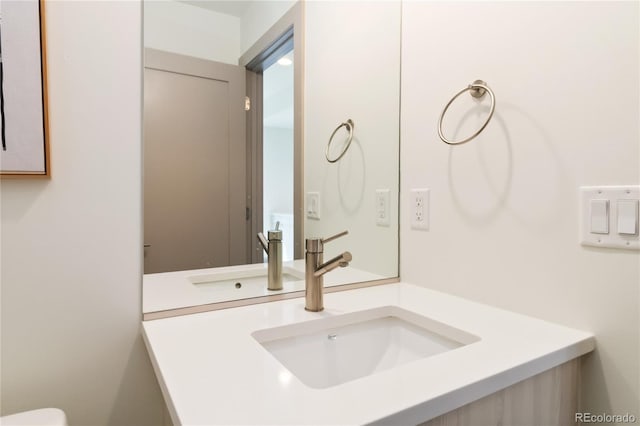 2409 Court Pl, Denver, CO 80205 - bathroom with vanity and toilet