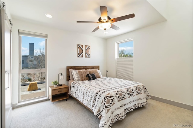 2409 Court Pl, Denver, CO 80205 - carpeted bedroom with recessed lighting, baseboards, and ceiling fan
