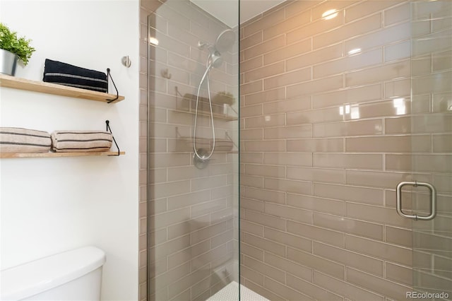 2409 Court Pl, Denver, CO 80205 - bathroom featuring a shower stall and toilet