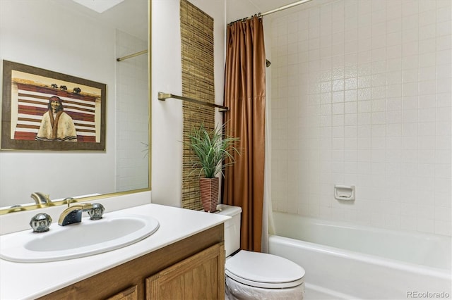 bathroom with vanity, toilet, and shower / tub combo