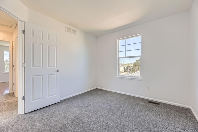 24763 E Crestridge Pl, Aurora, CO 80016 - empty room featuring visible vents, carpet, and baseboards