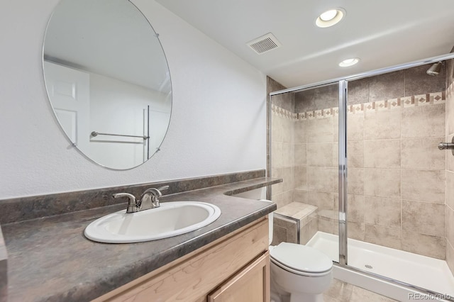 24763 E Crestridge Pl, Aurora, CO 80016 - full bath featuring vanity, a shower stall, toilet, and visible vents