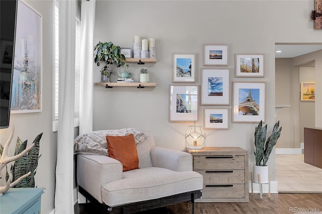 sitting room with light hardwood / wood-style floors