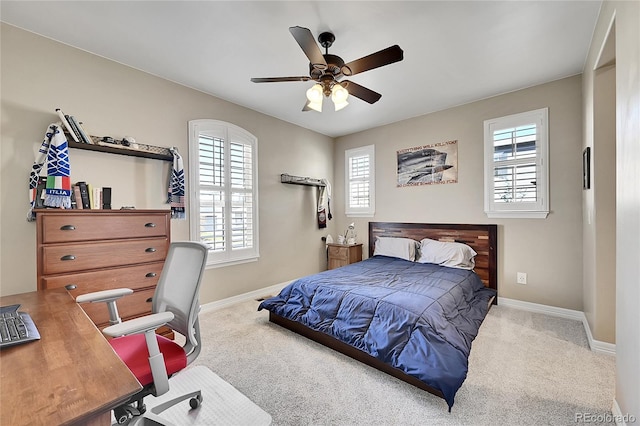 bedroom with light colored carpet and ceiling fan