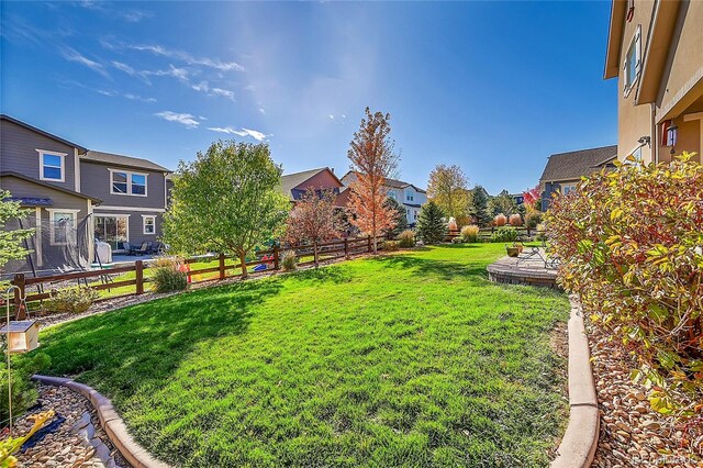 view of yard featuring a trampoline