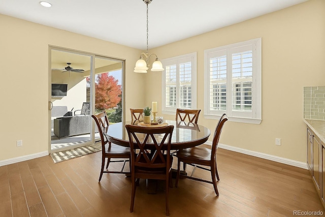 14672 Melco Ave, Parker, CO 80134 - dining room with healthy amount of natural light, wood finished floors, baseboards, and recessed lighting
