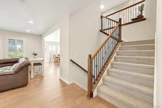 14672 Melco Ave, Parker, CO 80134 - stairway featuring wood finished floors, recessed lighting, and baseboards