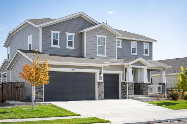 craftsman-style house featuring a garage