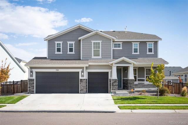 craftsman-style home with a garage and covered porch