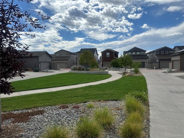 15600 Bolling, Denver, CO 80239 - surrounding community featuring a residential view, a yard, and a garage