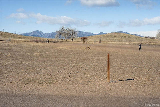 view of mountain feature featuring a rural view