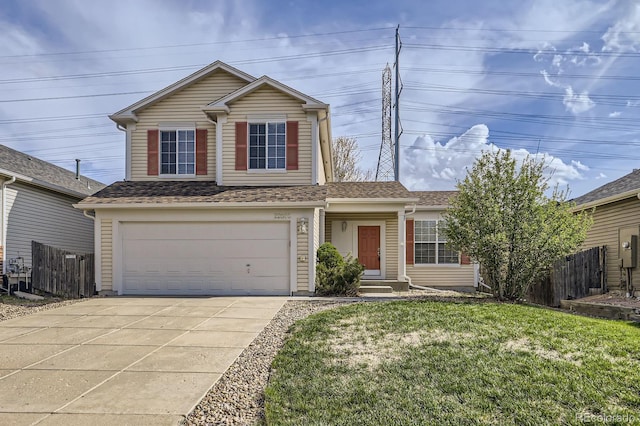 traditional-style house with driveway, a garage, and entry steps