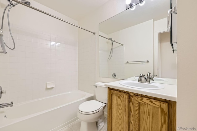 full bath featuring toilet, bathing tub / shower combination, vanity, and tile patterned flooring