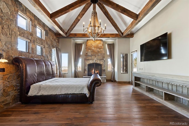 bedroom with high vaulted ceiling, dark hardwood / wood-style floors, a stone fireplace, and beamed ceiling