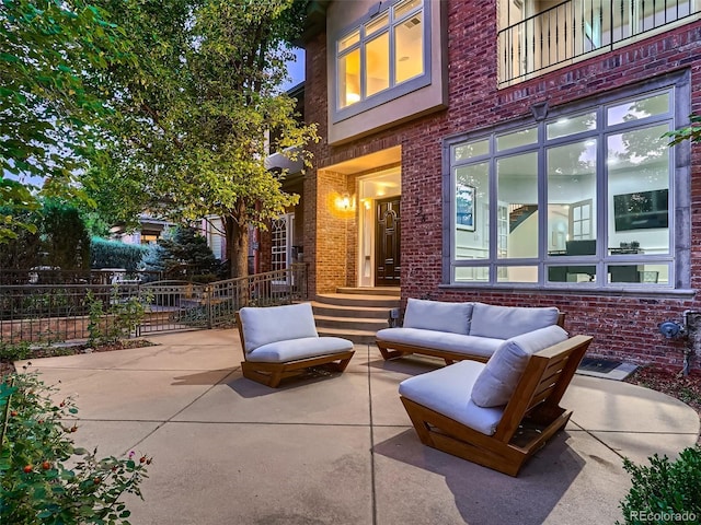 view of patio / terrace with fence and outdoor lounge area