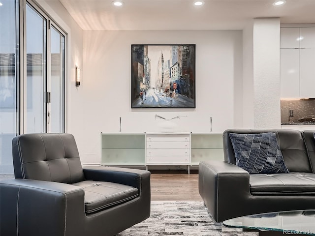 living room featuring recessed lighting and light wood finished floors
