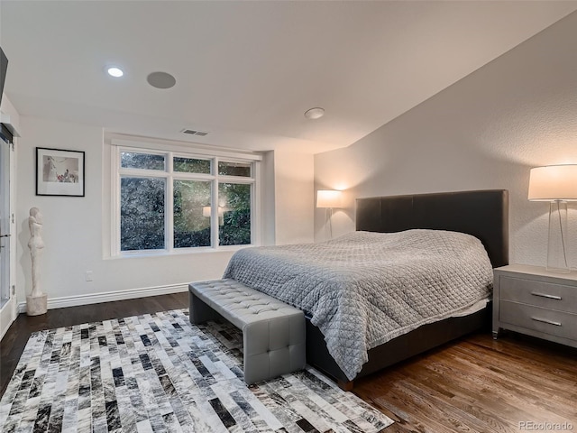 bedroom featuring recessed lighting, baseboards, visible vents, and wood finished floors