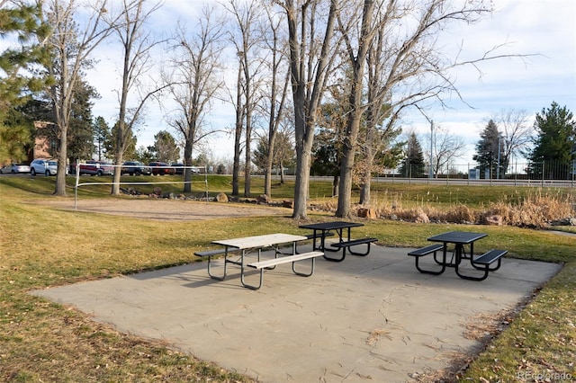 view of community featuring a lawn and volleyball court