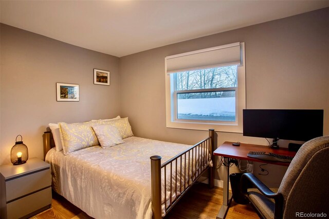 472 Ryan Gulch Rd, Silverthorne, CO 80498 - bedroom featuring wood finished floors, a desk, and baseboards