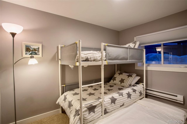 472 Ryan Gulch Rd, Silverthorne, CO 80498 - bedroom with a baseboard radiator, carpet flooring, and baseboards