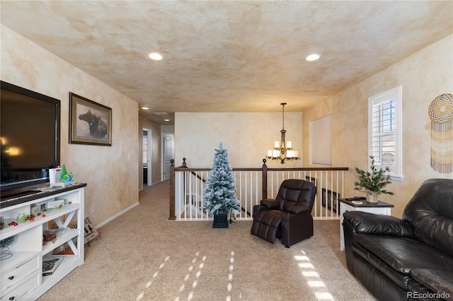 sitting room with light carpet and a chandelier