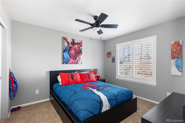 bedroom with ceiling fan and carpet