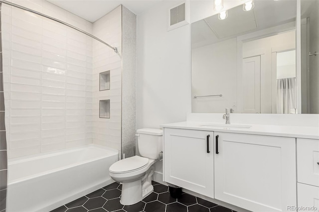 full bathroom with visible vents, toilet, tile patterned flooring, bathtub / shower combination, and vanity