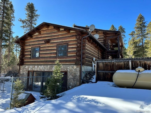 view of snow covered property