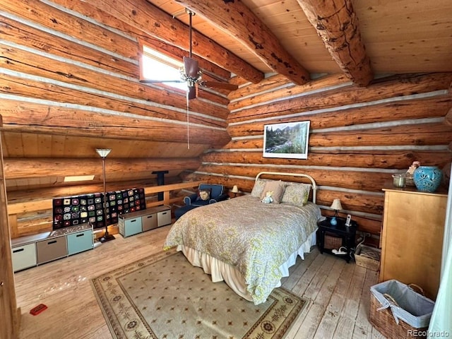 bedroom featuring hardwood / wood-style flooring, beamed ceiling, wooden ceiling, and rustic walls