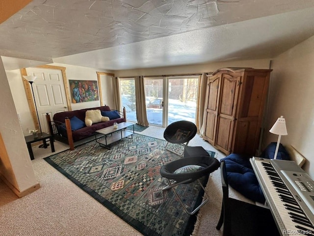 carpeted living room with a textured ceiling and french doors