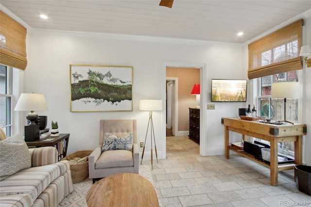 interior space featuring baseboards, recessed lighting, and crown molding