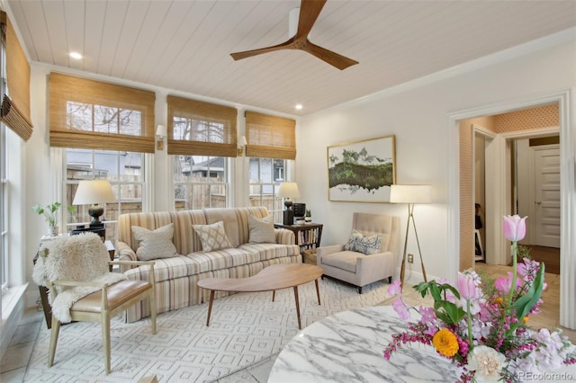 living room featuring a ceiling fan and recessed lighting