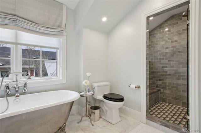 full bathroom with toilet, baseboards, a soaking tub, and a shower stall