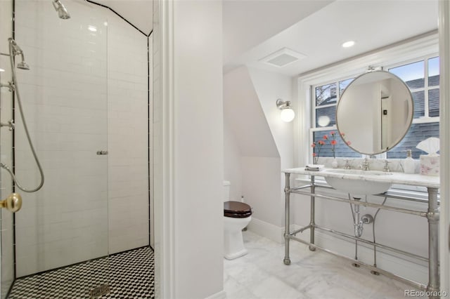 full bath featuring toilet, plenty of natural light, a tile shower, and visible vents