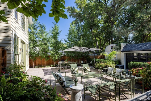 view of patio / terrace with outdoor lounge area and a fenced backyard